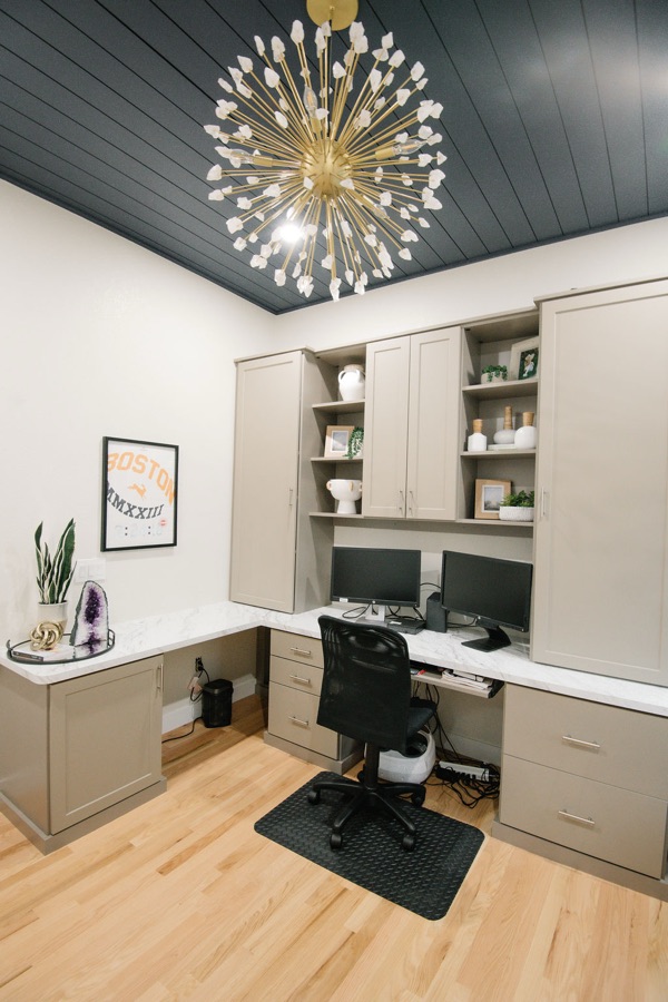 Navy shiplap ceiling detail with starburst brass light — Stonegate main floor renovation in Parker, Colorado