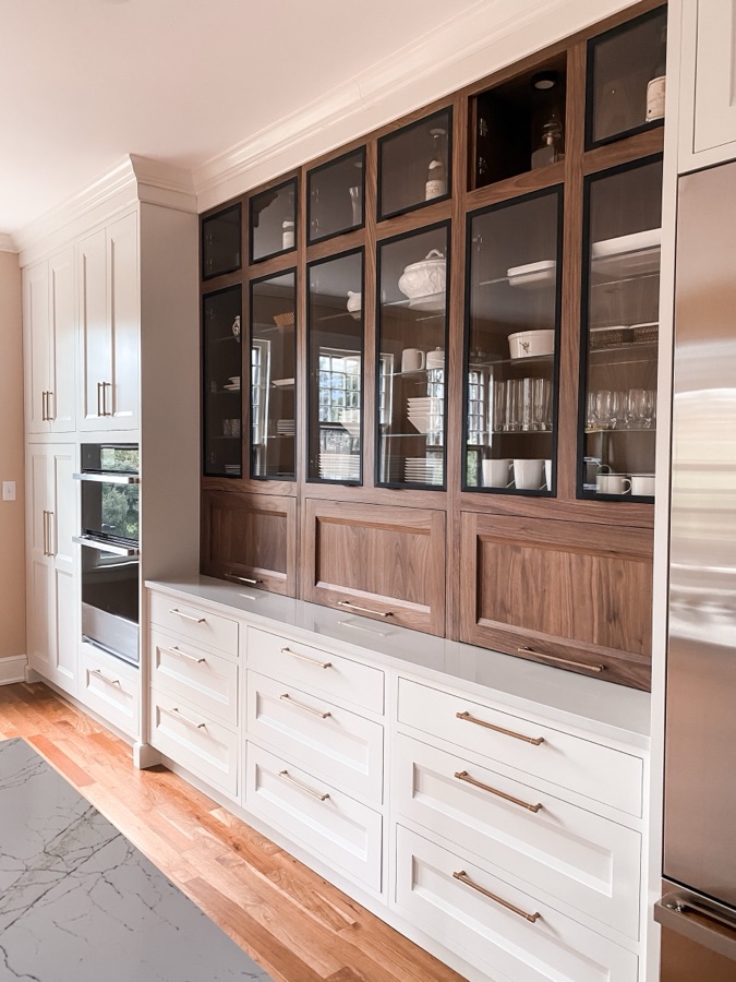 Full run of the two-tone cabinet wall with integrated wall ovens — historic Colorado Springs kitchen remodel