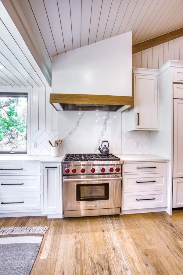 Kitchen corner with shiplap vault and black-framed windows — Fulton Street whole house renovation in Greenwood Village
